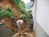 Landslide-Clearing Debris